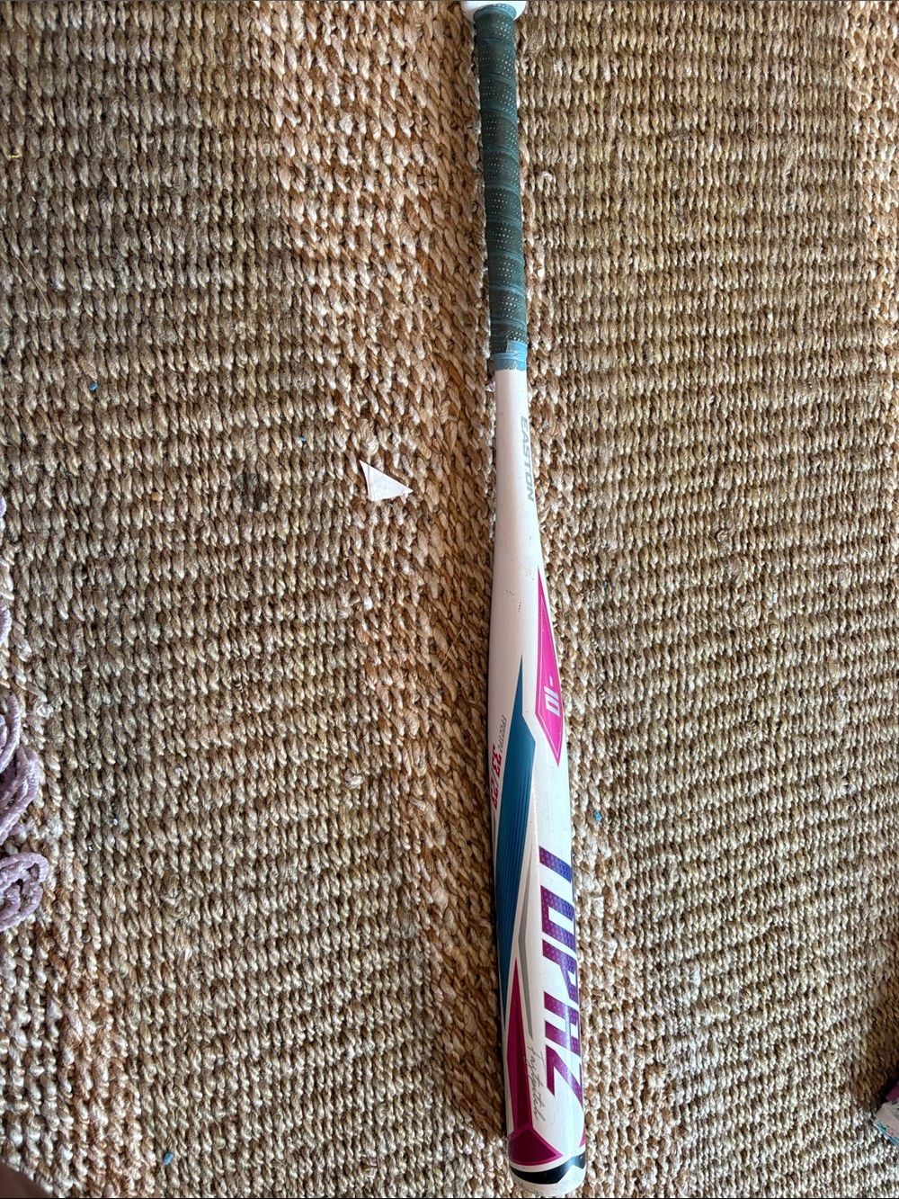 Easton White softball Bat with Blue Logo and Green Grip